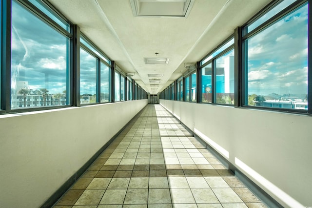 1501 S Ocean Blvd Unit 1535, Myrtle Beach, SC 29577 - corridor featuring tile patterned floors and baseboards