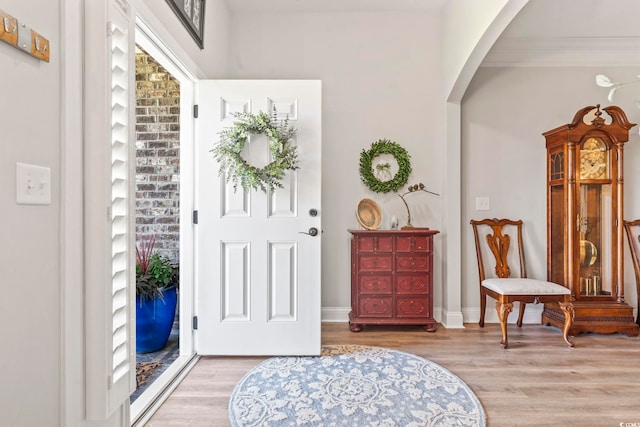 4002 Bayfield Loop, Murrells Inlet, SC 29576 - foyer featuring arched walkways, wood finished floors, and crown molding