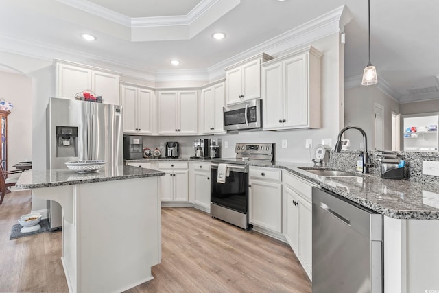 4002 Bayfield Loop, Murrells Inlet, SC 29576 - kitchen featuring stainless steel appliances, light wood-style floors, recessed lighting, stone counters, and crown molding