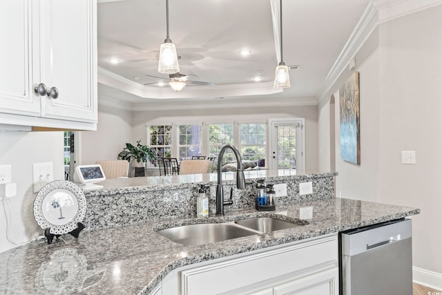 4002 Bayfield Loop, Murrells Inlet, SC 29576 - kitchen featuring stainless steel dishwasher, ceiling fan, ornamental molding, plenty of natural light, and white cabinets