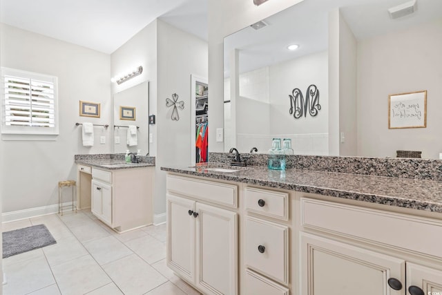 4002 Bayfield Loop, Murrells Inlet, SC 29576 - full bath featuring tile patterned flooring, two vanities, and a walk in closet