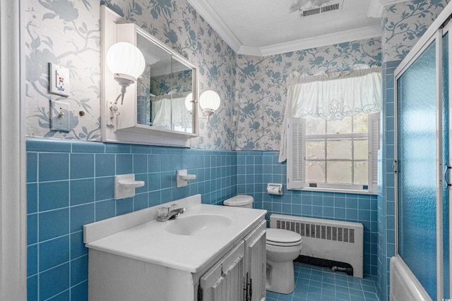 4101 N Ocean Blvd, Myrtle Beach, SC 29577 - bathroom with radiator, wallpapered walls, ornamental molding, vanity, and wainscoting