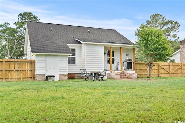 322 Azalea Ave, Marion, SC 29571 - back of house featuring a fenced backyard and a shingled roof