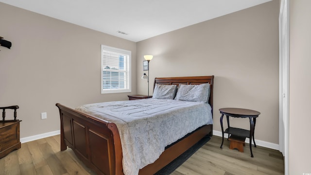 521 White River Dr Unit 21C, Myrtle Beach, SC 29579 - bedroom featuring light wood-style floors and baseboards