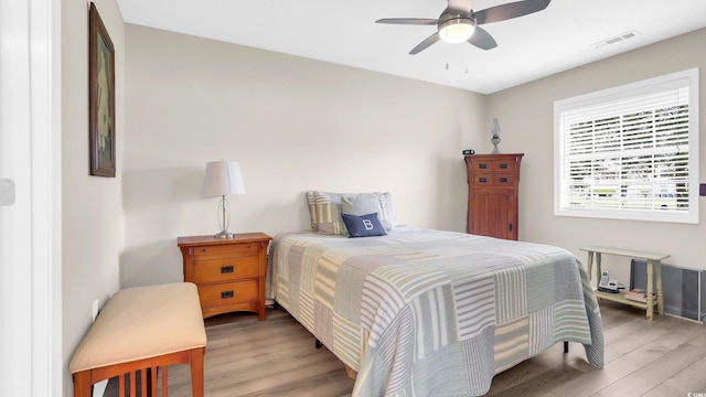 521 White River Dr Unit 21C, Myrtle Beach, SC 29579 - bedroom featuring light wood finished floors and ceiling fan