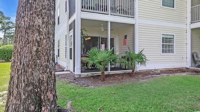 521 White River Dr Unit 21C, Myrtle Beach, SC 29579 - view of home's exterior with a balcony and a yard