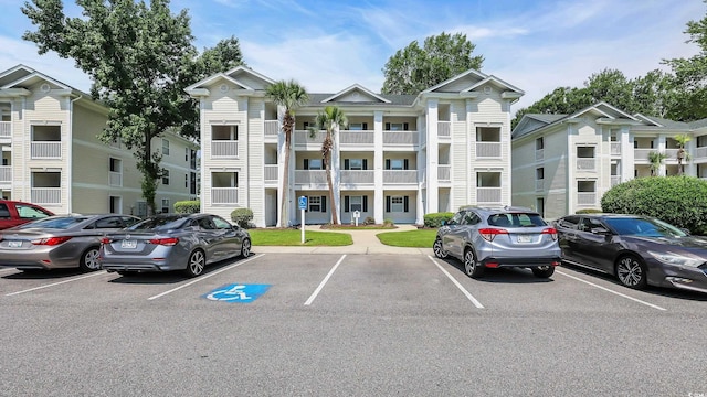 521 White River Dr Unit 21C, Myrtle Beach, SC 29579 - view of apartment building / complex featuring uncovered parking