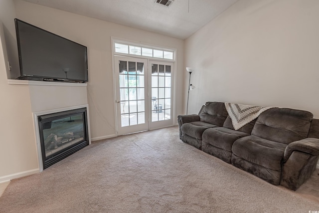 9755 Leyland Dr Unit 11, Myrtle Beach, SC 29572 - living room with carpet flooring and a glass covered fireplace
