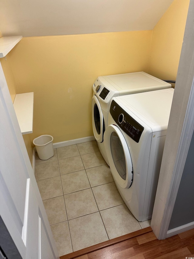 390 Boundary Ave, Murrells Inlet, SC 29576 - laundry room featuring independent washer and dryer and light tile patterned flooring