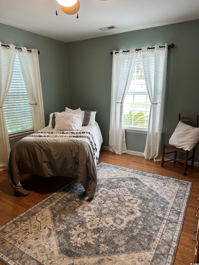 390 Boundary Ave, Murrells Inlet, SC 29576 - bedroom featuring wood finished floors and a ceiling fan