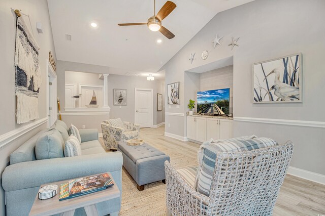 6203 Catalina Dr Unit 935, North Myrtle Beach, SC 29582 - living room with light wood-type flooring, ceiling fan, high vaulted ceiling, recessed lighting, and ornate columns