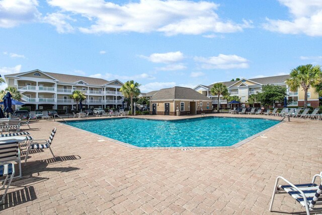 6203 Catalina Dr Unit 935, North Myrtle Beach, SC 29582 - community pool with a patio area