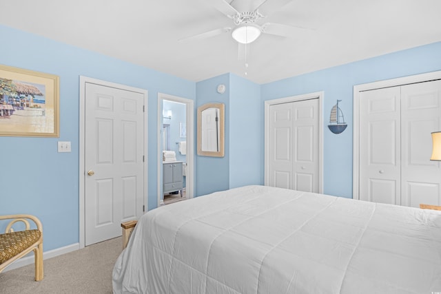 1020 Ocean Blvd S Unit A, Surfside Beach, SC 29575 - carpeted bedroom with two closets, ceiling fan, and ensuite bath