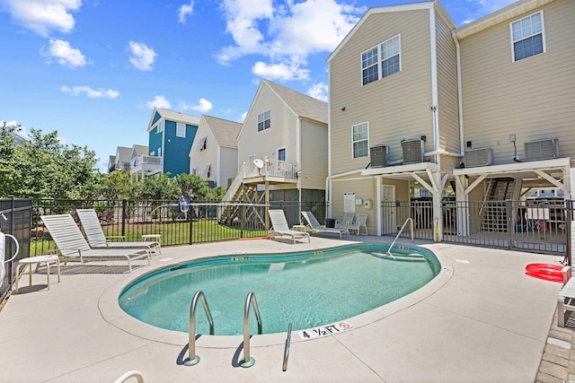 1020 Ocean Blvd S Unit A, Surfside Beach, SC 29575 - community pool featuring a residential view and a patio