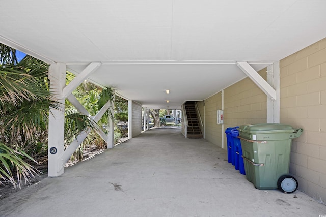 1020 Ocean Blvd S Unit A, Surfside Beach, SC 29575 - view of parking featuring stairway