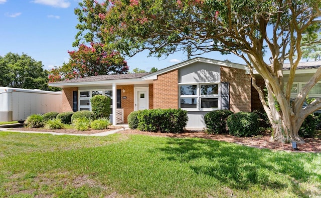 3748 Otter St Unit 3748, Myrtle Beach, SC 29577 - view of front of property featuring brick siding and a front lawn