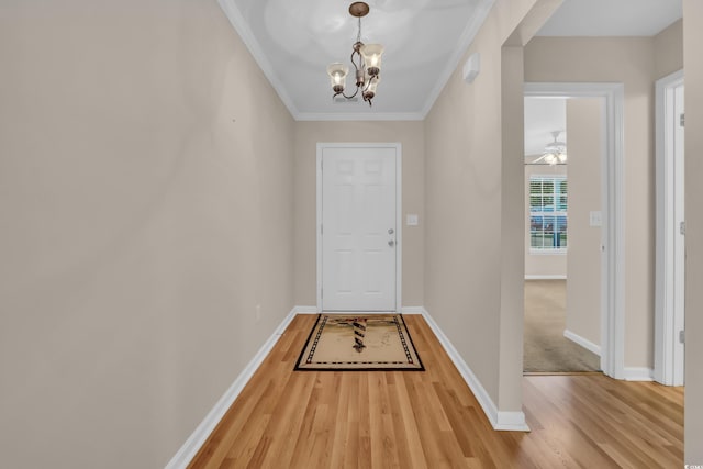 244 Devonbrook Pl, Longs, SC 29568 - doorway to outside featuring light wood-style flooring, a chandelier, and ornamental molding