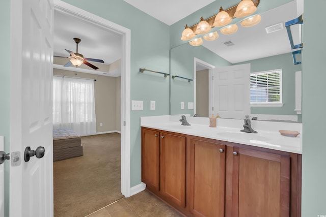 244 Devonbrook Pl, Longs, SC 29568 - bathroom with ceiling fan, double vanity, and tile patterned flooring