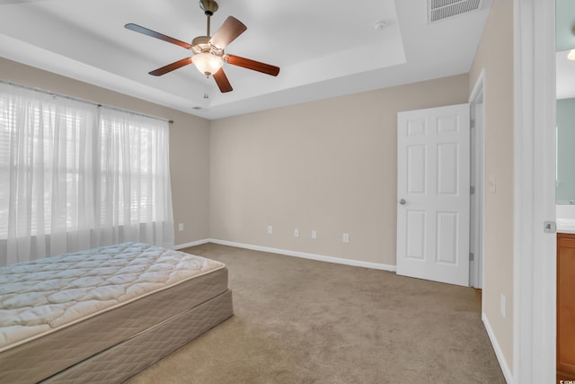 244 Devonbrook Pl, Longs, SC 29568 - carpeted bedroom with a raised ceiling and a ceiling fan