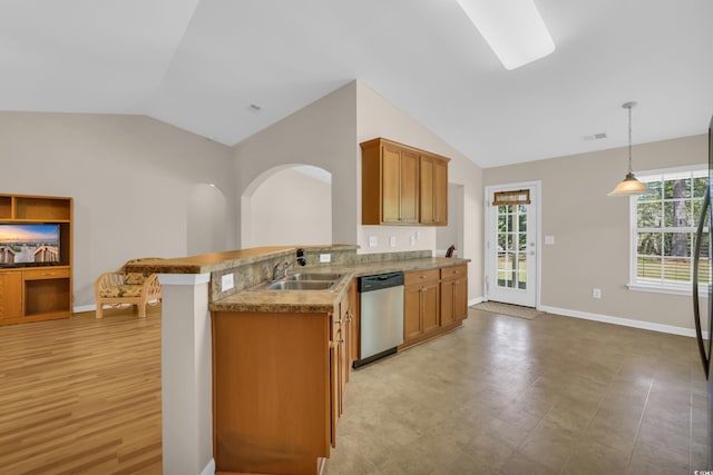 244 Devonbrook Pl, Longs, SC 29568 - kitchen featuring dishwasher, lofted ceiling, plenty of natural light, hanging light fixtures, and a peninsula