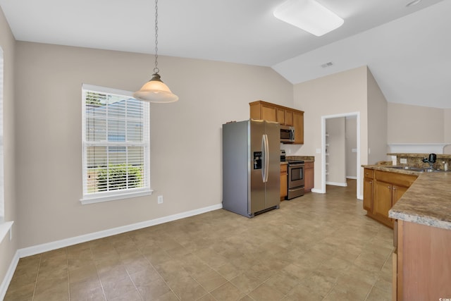 244 Devonbrook Pl, Longs, SC 29568 - kitchen with appliances with stainless steel finishes, lofted ceiling, decorative light fixtures, brown cabinetry, and light countertops