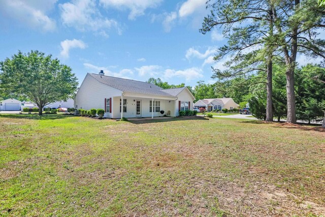 244 Devonbrook Pl, Longs, SC 29568 - back of property featuring a lawn