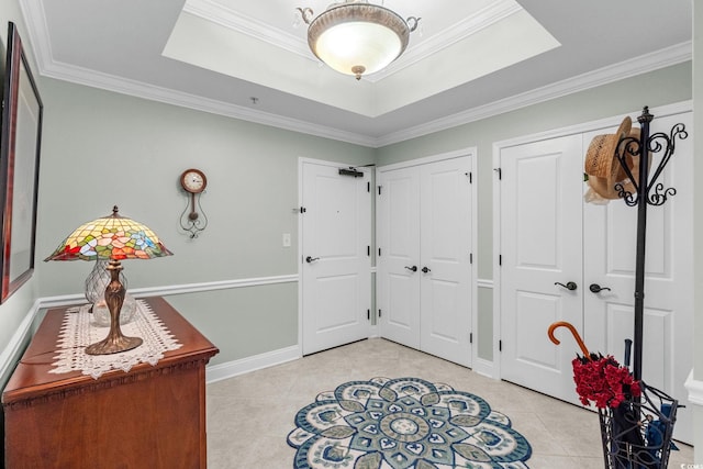 9547 Edgerton Dr Unit 405, Myrtle Beach, SC 29572 - entryway with a tray ceiling, light tile patterned flooring, and ornamental molding