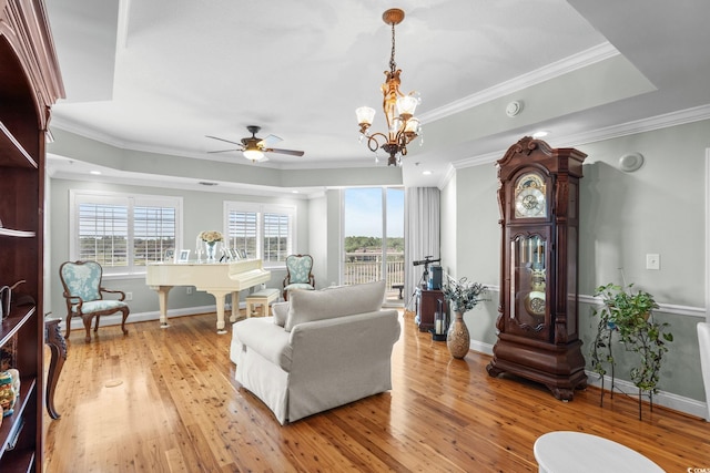 9547 Edgerton Dr Unit 405, Myrtle Beach, SC 29572 - living room featuring healthy amount of natural light, light wood-style floors, crown molding, a ceiling fan, and recessed lighting