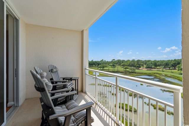 9547 Edgerton Dr Unit 405, Myrtle Beach, SC 29572 - balcony featuring a water view and view of wooded area