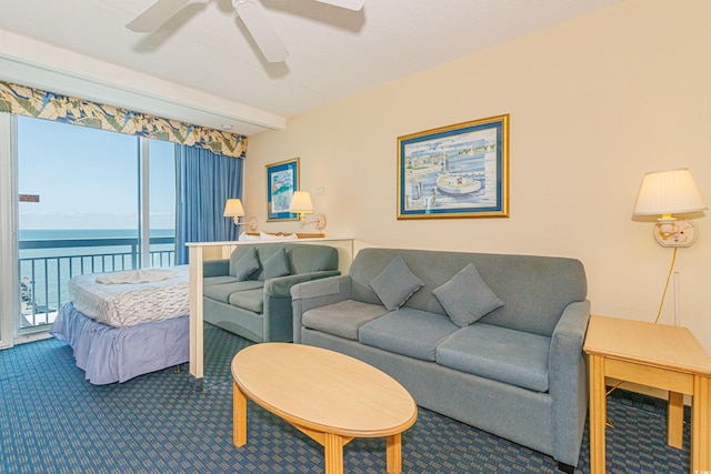 1304 N Ocean Blvd Unit 1104, Myrtle Beach, SC 29577 - living area featuring carpet, a water view, and a ceiling fan