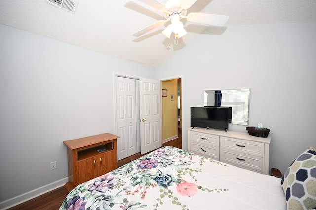 144 Balsa Dr, Longs, SC 29568 - bedroom with dark wood-style floors, vaulted ceiling, a closet, and a ceiling fan