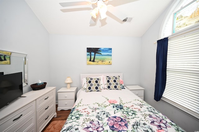 144 Balsa Dr, Longs, SC 29568 - bedroom featuring vaulted ceiling, dark wood-style flooring, and ceiling fan