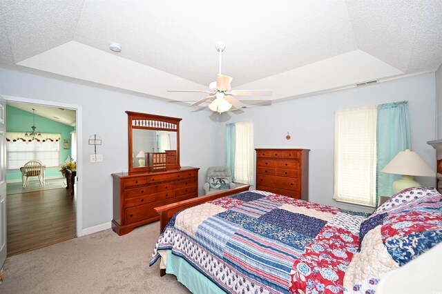 144 Balsa Dr, Longs, SC 29568 - bedroom featuring carpet floors, vaulted ceiling, ceiling fan, and a textured ceiling