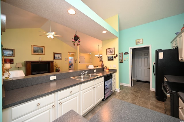 144 Balsa Dr, Longs, SC 29568 - kitchen featuring electric stove, lofted ceiling, dark countertops, white cabinetry, and ceiling fan