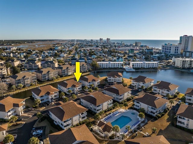 300 Shorehaven Dr Unit I-2, North Myrtle Beach, SC 29582 - drone / aerial view of a nearby body of water and a pool area