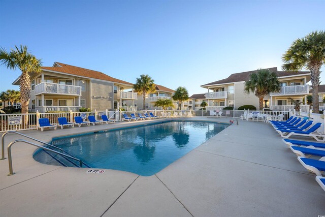 300 Shorehaven Dr Unit I-2, North Myrtle Beach, SC 29582 - community pool featuring a residential view and a patio