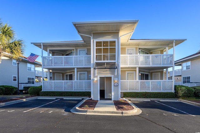 300 Shorehaven Dr Unit I-2, North Myrtle Beach, SC 29582 - view of property featuring uncovered parking