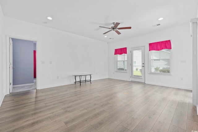 219 Glenmoor Dr, Conway, SC 29526 - empty room with a ceiling fan, wood finished floors, and recessed lighting