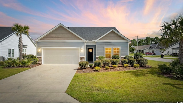 219 Glenmoor Dr, Conway, SC 29526 - view of front facade with a garage, driveway, a front yard, and stone siding