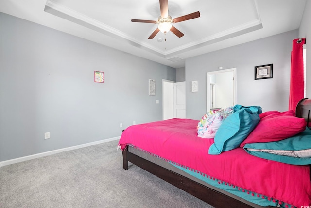 219 Glenmoor Dr, Conway, SC 29526 - carpeted bedroom with a tray ceiling, ornamental molding, and a ceiling fan