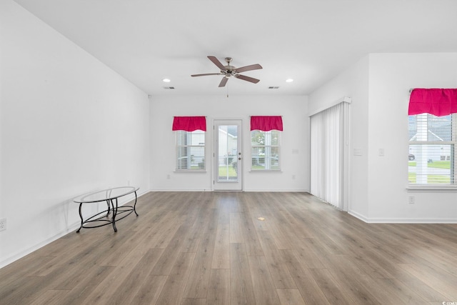 219 Glenmoor Dr, Conway, SC 29526 - spare room with plenty of natural light, wood finished floors, ceiling fan, and recessed lighting