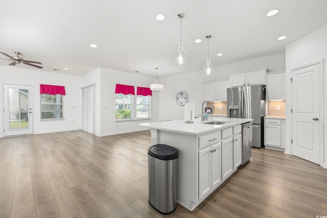 219 Glenmoor Dr, Conway, SC 29526 - kitchen with stainless steel appliances, light countertops, open floor plan, recessed lighting, and wood finished floors