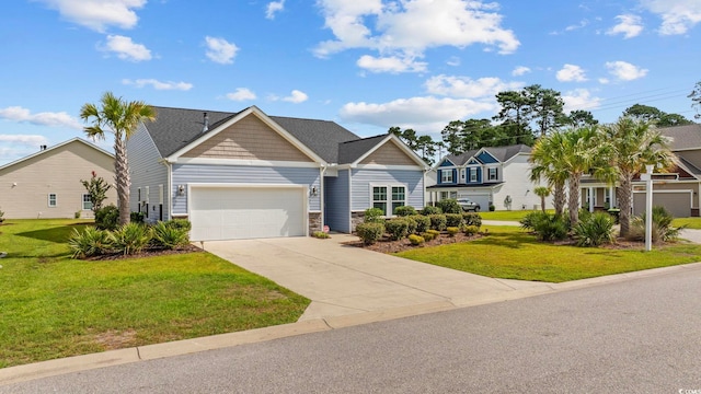 219 Glenmoor Dr, Conway, SC 29526 - view of front of property with an attached garage, stone siding, driveway, and a front lawn