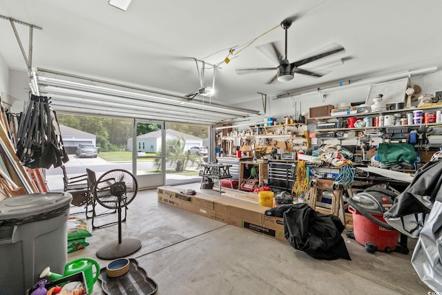 2781 Desert Rose St, Little River, SC 29566 - garage with ceiling fan and a workshop area
