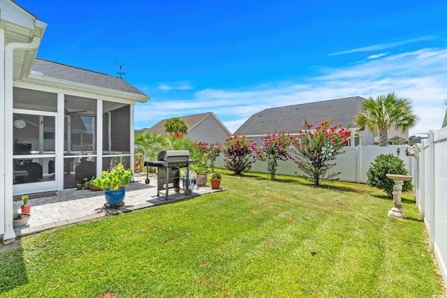 2781 Desert Rose St, Little River, SC 29566 - fenced backyard with a patio area and a sunroom