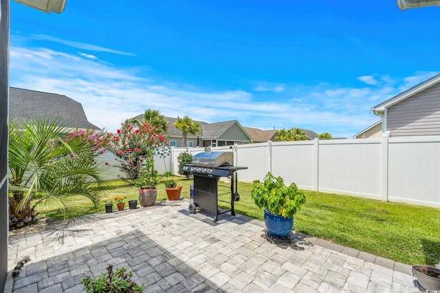 2781 Desert Rose St, Little River, SC 29566 - fenced backyard featuring a patio and area for grilling