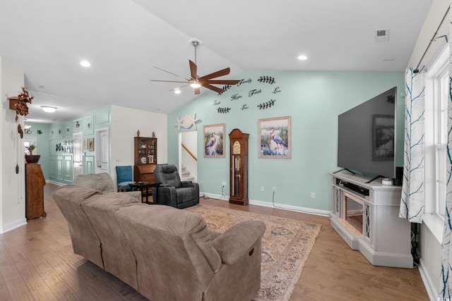 2781 Desert Rose St, Little River, SC 29566 - living room featuring stairs, a ceiling fan, light wood-style floors, lofted ceiling, and recessed lighting