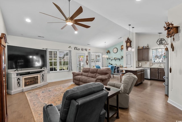 2781 Desert Rose St, Little River, SC 29566 - living area featuring vaulted ceiling, ceiling fan, wood finished floors, and recessed lighting