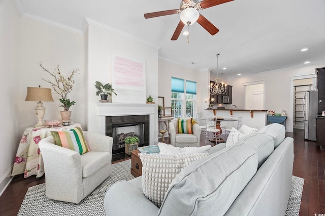 1348 Peterson St, Myrtle Beach, SC 29577 - living area with dark wood-style floors, recessed lighting, a chandelier, crown molding, and ceiling fan