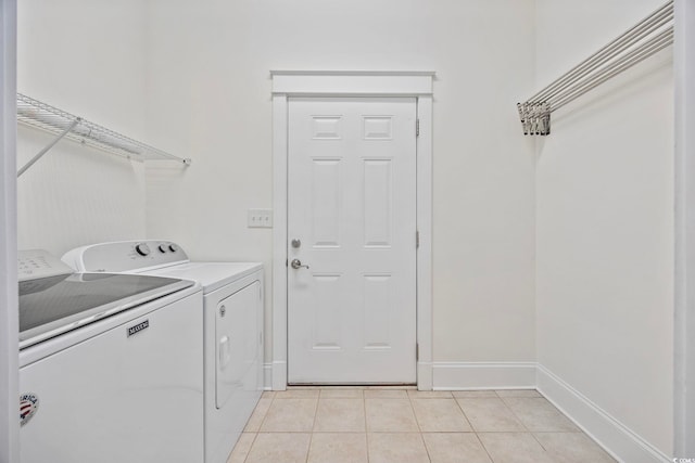 1348 Peterson St, Myrtle Beach, SC 29577 - washroom featuring washer and clothes dryer and light tile patterned floors
